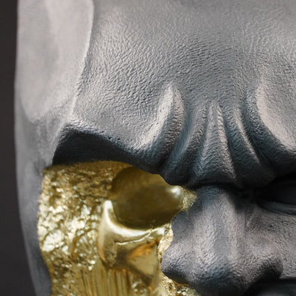 Shadow Knight – Matte Black Gilded, close-up of the upper mask. Detailed view of the matte black texture, sculpted brow, and gilded fracture extending across the face.